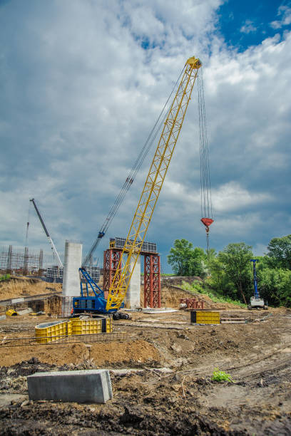 istock Crane on the construction of a bridge 1182729158