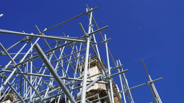 istock Metal construction on sky background. Exterior steel construction for building work. Engineering concept 1182729247