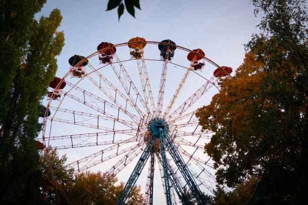 istock ferris wheel in the forest. autumn 1182730933