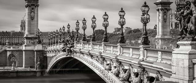 Close-up of Pont Alexandre III Bridge with its candelabras and lamp posts in Black & White. Paris, France, 7th Arrondissement