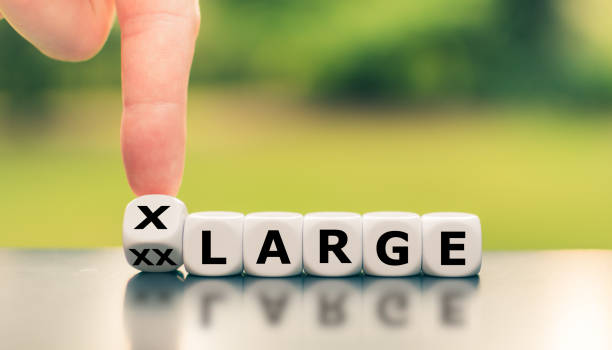istock Reducing weight concept. Hand turns a dice and changes the expression 
