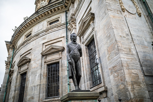 Status of  Søren Kierkegaard, 1813-1855, outside Marble Church, Copenhagen, Denmark.\nMarble Church was built between 1749-1894. It's dome with a diameter of 31 m is the largest in Scandinavia.\nSøren Kierkegaard is a world famous philosopher