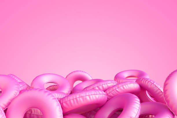 istock Inflatable circle on a pink pastel background. Summer vacation concept. Minimal abstract wallpaper concept. Velvet season. Flat lay. 3d render 1182734280