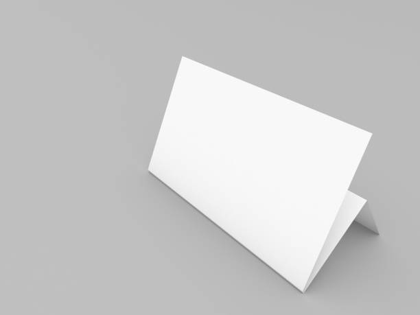 istock Folded white brochure mockup on gray background. 1182734841