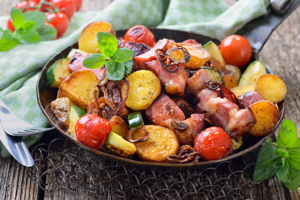 istock Fried potatoes with pork neck 1182740760