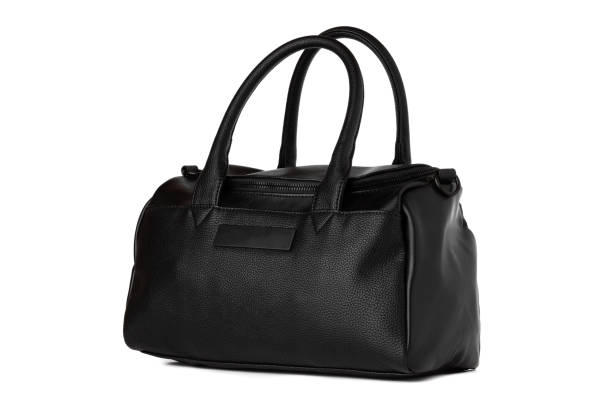 istock Black bag on a white background. Leather bag close-up isolated on a white background. 1182741274