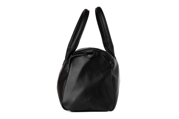 istock Black bag on a white background. Leather bag close-up isolated on a white background. 1182742506