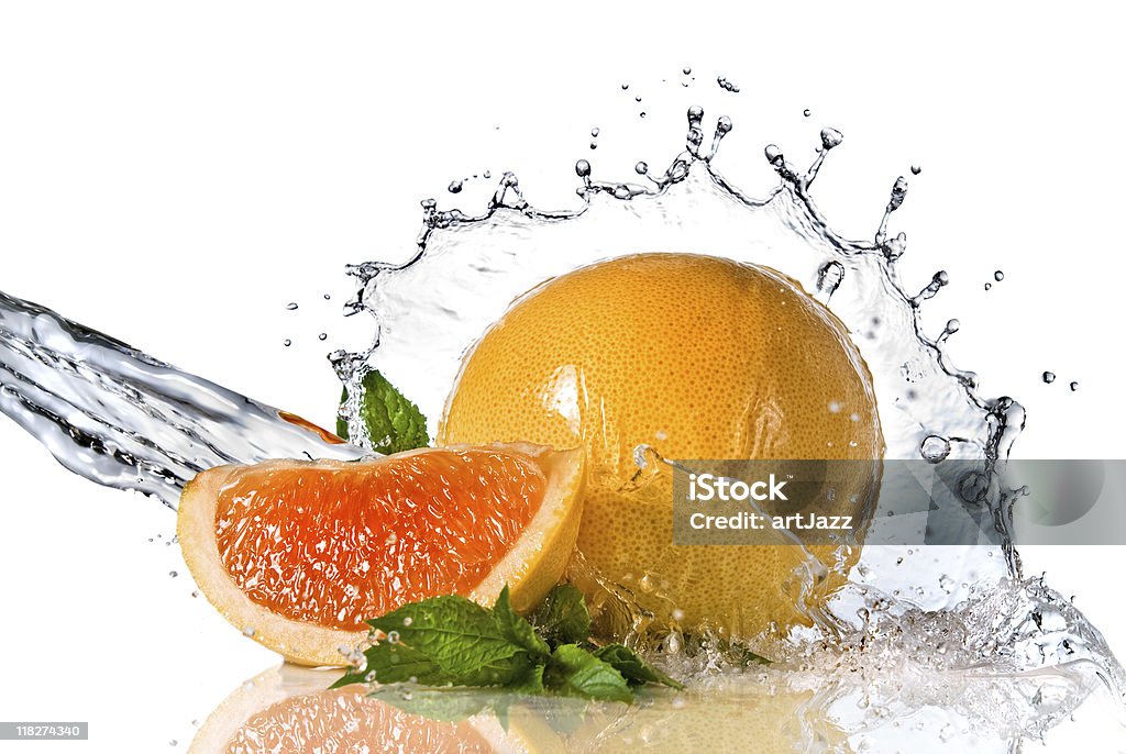 Water splash on the orange  Citrus Fruit Stock Photo