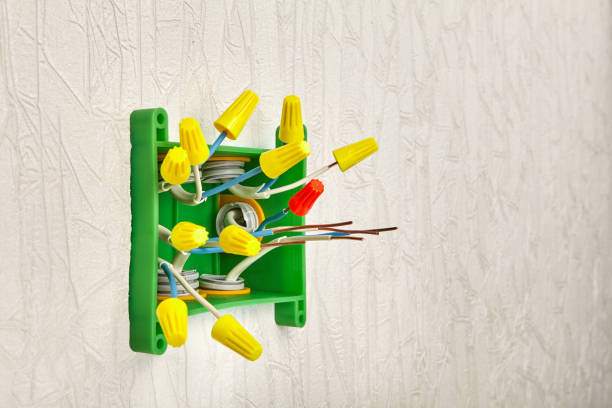 istock Twisting connectors for electrical wiring. 1182746613