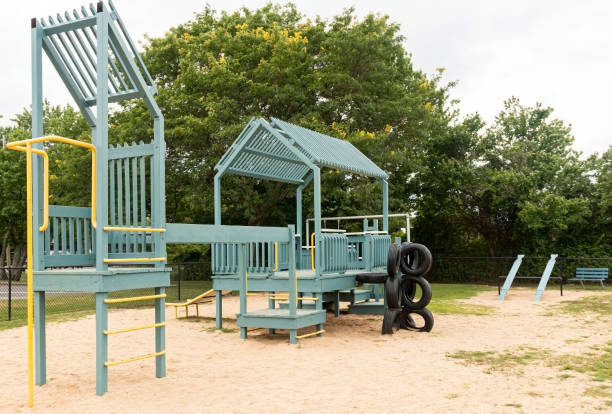 istock Old wood playground on sand 1182747793