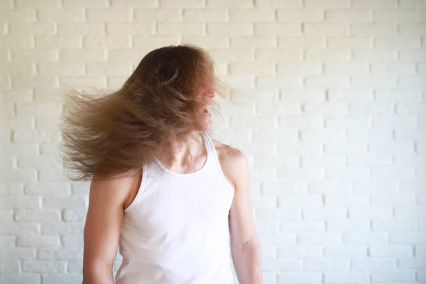 istock Young man with long hair 1182747818