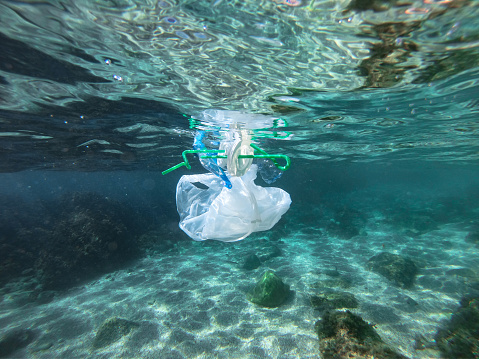 Plastic bags and bottles pollution in sea