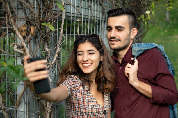 istock Young Couple Taking Selfie 1182761426