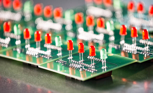 istock Close-up of a panel with red and green light bulbs 1182766457