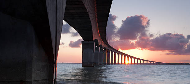 Bridge over the water  bridge crossing cloud built structure stock pictures, royalty-free photos & images