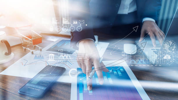 istock Businessman analyzing sales data and economic growth and pointing at business report document with icon and graph financial, marketing, online banking and payment, business planning and strategy. 1182774062