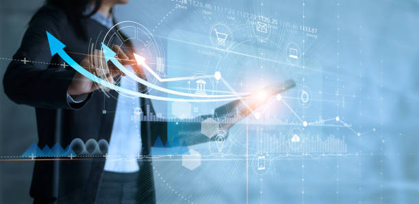 istock Business woman using tablet analyzing sales data and drawing growth graph with icon customer network connection on virtual interface, Business strategy, Digital marketing. 1182774088
