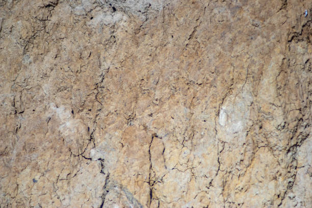 istock Clay texture on the edge of a cliff 1182775221