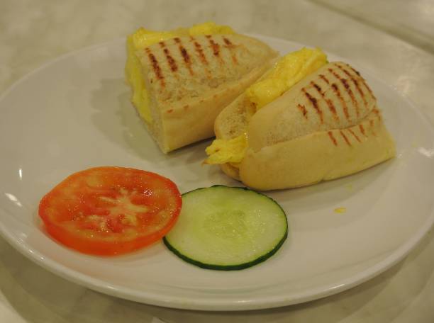 istock Bread with cucumber and tomato 1182775252