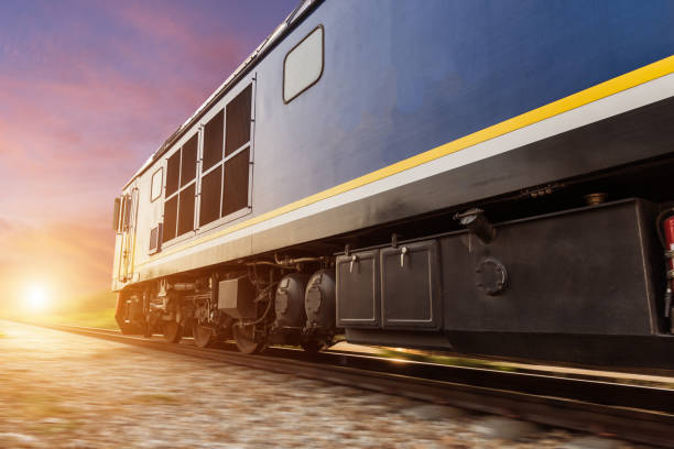 istock High speed diesel train on tracks with motion blur 1182776408
