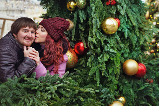 istock Lovers walk at the christmas market 1182779194