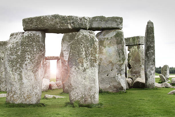 istock Sun setting at Stonehenge prehistoric stone circle, Wiltshire, England 118278084