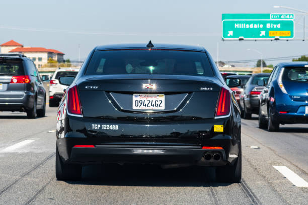 Oct 12, 2019 San Mateo / CA / USA - Cadillac CT6 vehicle driving on a heavy trafficked freeway in San Francisco Bay; Cadillac is a division of the American automobile manufacturer General Motors (GM)