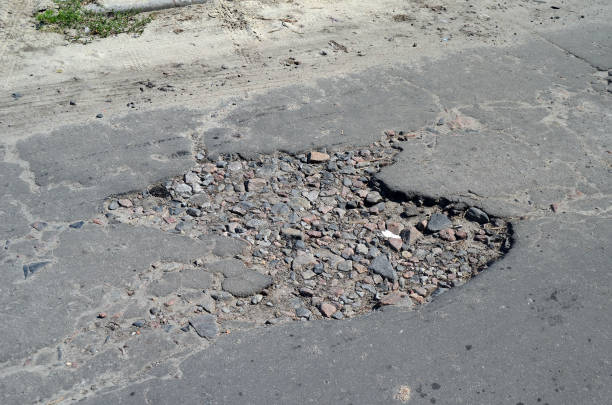 istock Poor condition of the road surface. 1182785995
