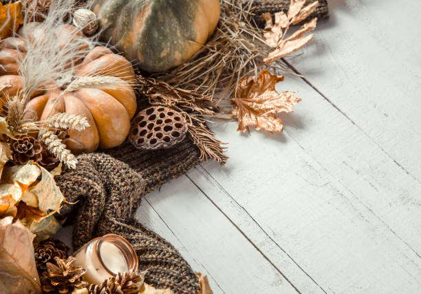 istock Autumn background with decorative items and pumpkin. 1182788909