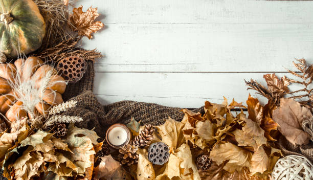 istock Autumn background with decorative items and pumpkin. 1182788910