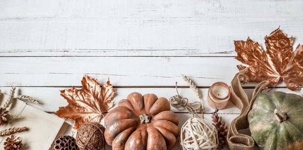 istock Autumn background with decorative items and pumpkin. 1182788911