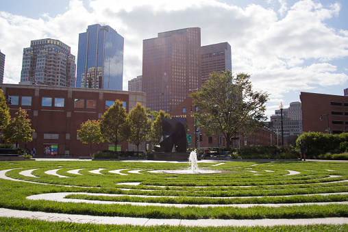 Boston, Massachusetts, USA - September 18, 2019:   Fountain and open green space along the Rose Kennedy Greenway, Boston's newest park.