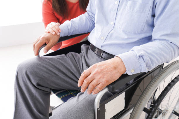 istock Women care for elderly person 1182796762
