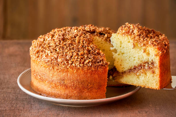 istock Almond cinnamon cake on wooden table. Close up 1182799902