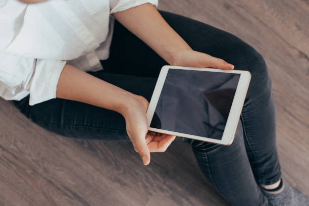 istock A picture of a young woman working on a tablet computer 1182799963