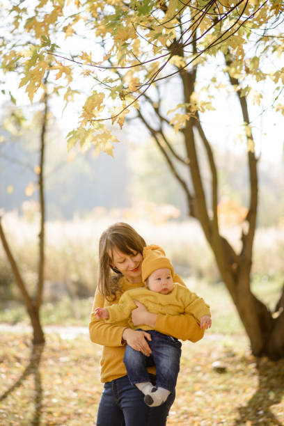 istock happy mother with her daughter for a walk 1182800219