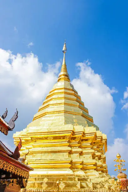 Photo of Golden pagoda and umbrella in Wat Phra That Doi Suthep is the popular tourist destination of Chiang Mai, Thailand.