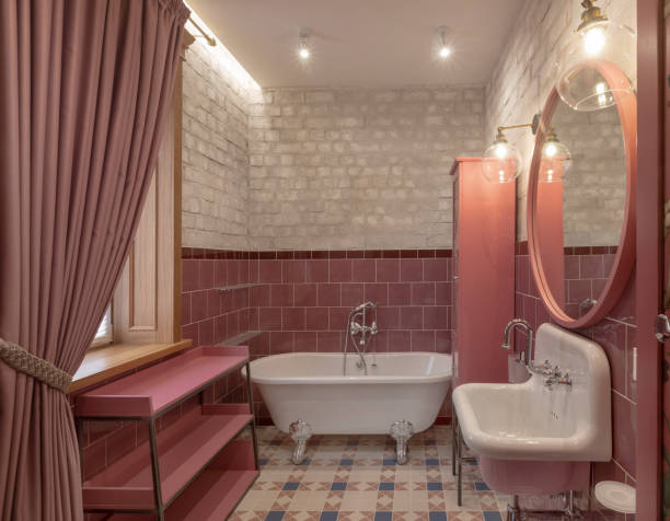 istock Elegant bathroom with modern design in pink color 1182801627