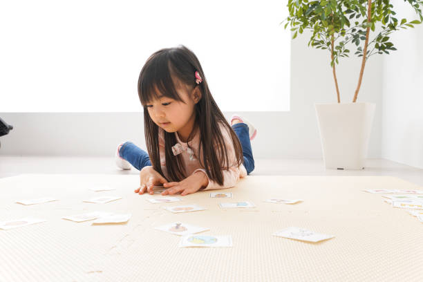 istock Girl studying English with smile 1182801648