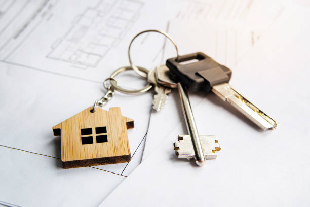 istock Model house, construction plan for house building, keys. Real Estate Concept. Top view. keychain in the form of a house 1182801691