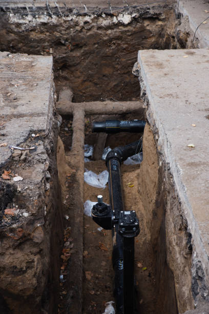 istock Repair work to replace the grub close-up in city 1182804037