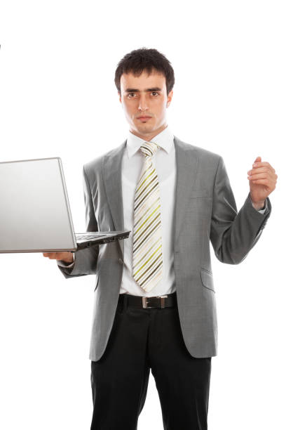 istock A Businessman Holding a Laptop in Hand, White Background 1182810540