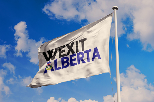Wexit Alberta flag waving on the sky