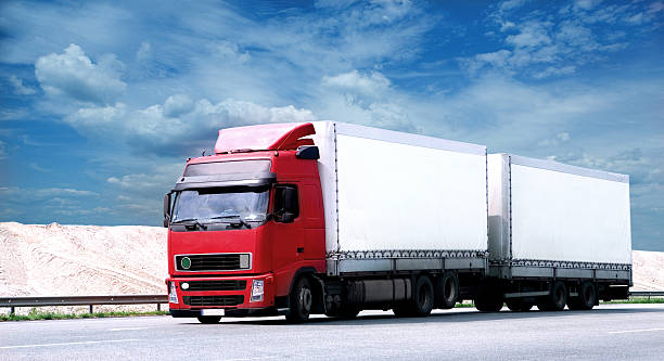 istock A tractor-trailer hauling two trailers along the highway 118281144