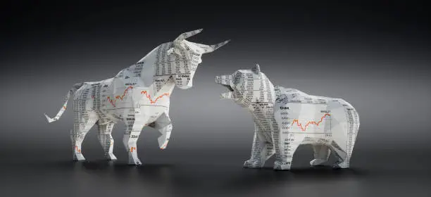 Bull and Bear made of Financial Newspaper with Charts on dark grey Background