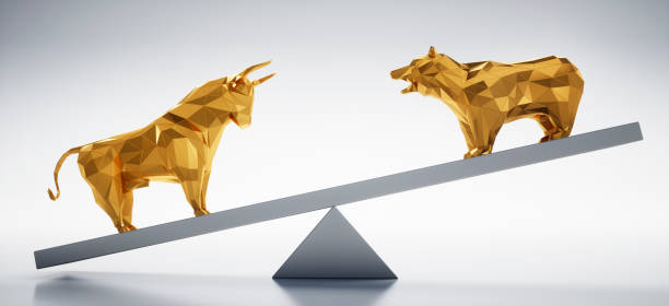 istock Golden Bull and Bear on Seesaw 1182812164