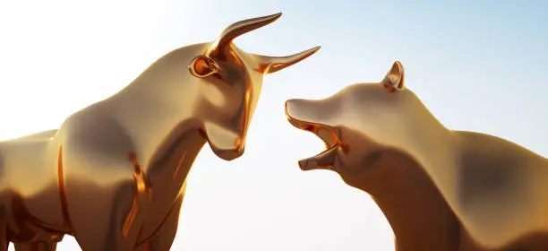 Photo of Closeup of golden Bull and Bear