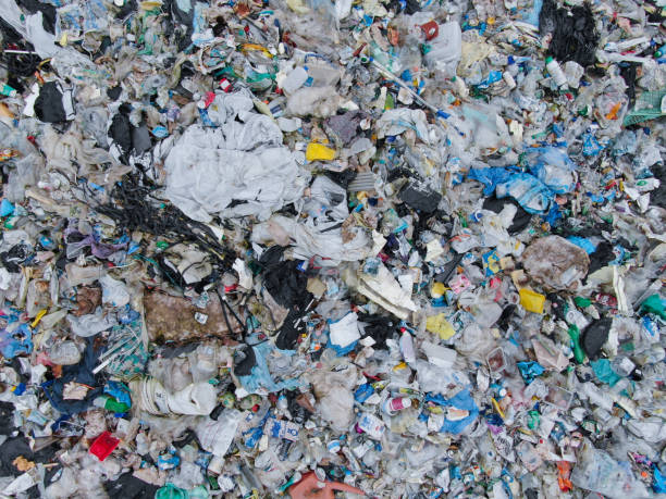 istock AERIAL: View from above of a stinky heap of garbage in a plastic sorting site 1182823761
