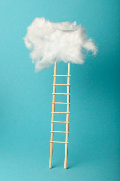 istock Stepladder into clouds, entrepreneur business success concept. Progress and growth up 1182824683