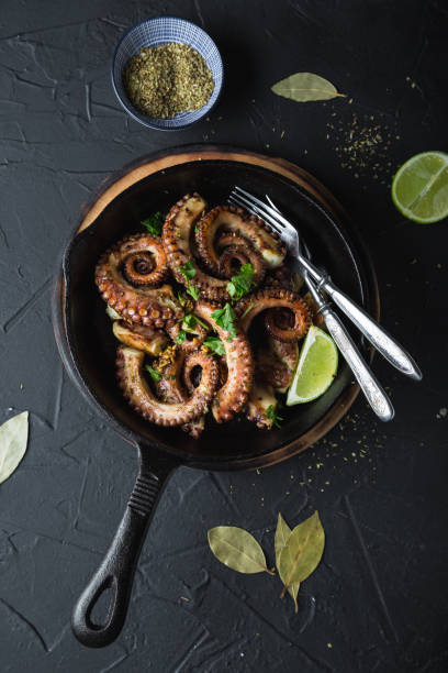 istock Grilled octopus with herbs and lime 1182828781